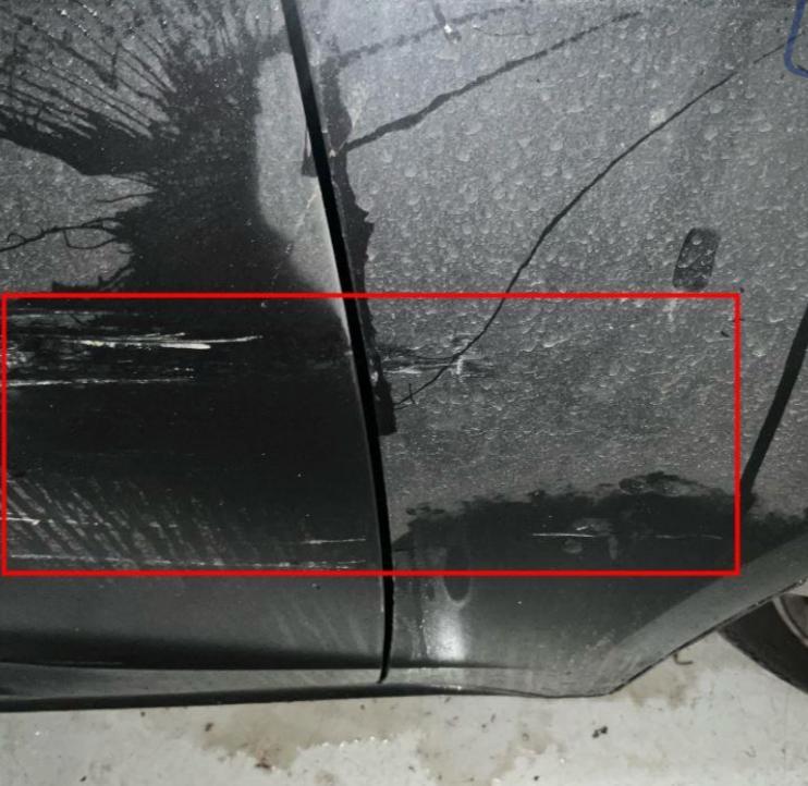 Detailaufnahme eines Fahrzeugschadens
